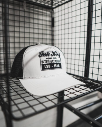 White Black International Trucker Hat